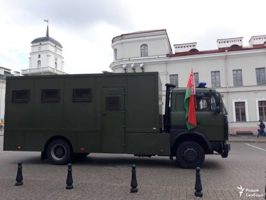 Police van in Minsk decorated by the red-green flag. August 2020, Minsk. Photo: Radio Free Europe.