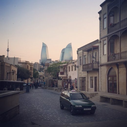 Old City of Baku with the new modern Flame Towers in the background. May 11, 2015. Photo: Sofie Bedford
